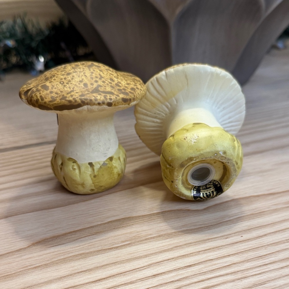 Vintage set of ceramic mushroom-shaped salt and pepper shakers. 
Made in Japan